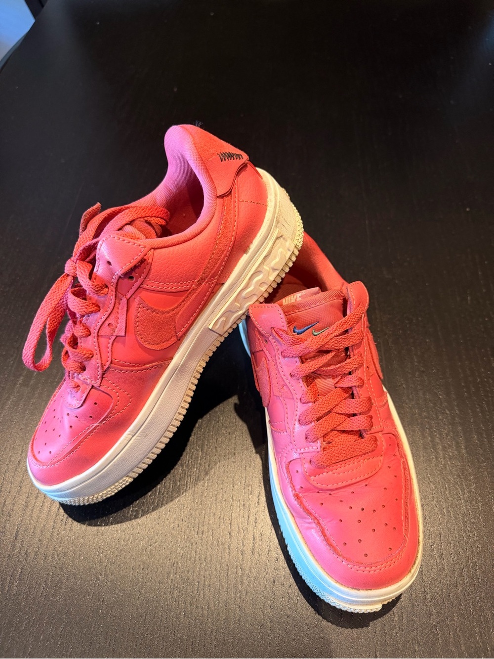 Nike women’s Coral Pink Low-Top Sneakers